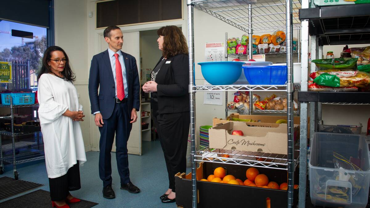 Andrew Leigh (centre) with Labor MP Linda Burney and Ruth Zanker at the Communities@Work Gungahlin community pantry in 2019. Picture: Elesa Kurtz