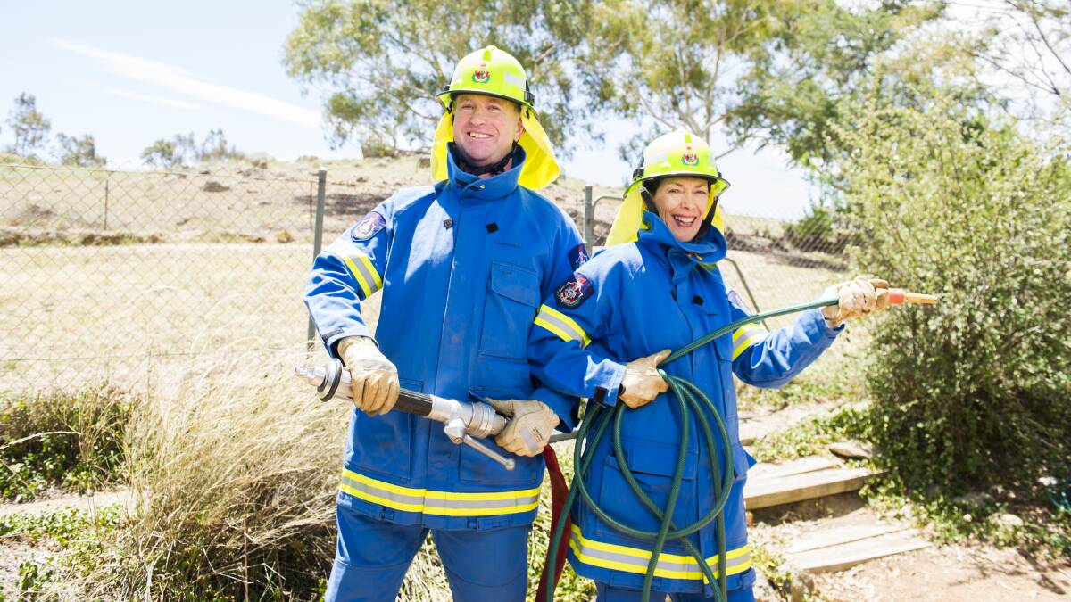 Community fire unit volunteers Malcom Harrington and Gloria Jackson at their home in Kambah. Picture: Dion Georgopoulos