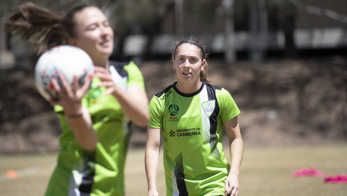 Laura Hughes and Canberra teammate Karly Roestbakken are on the same connecting flight to Europe. Picture: Sitthixay Ditthavong