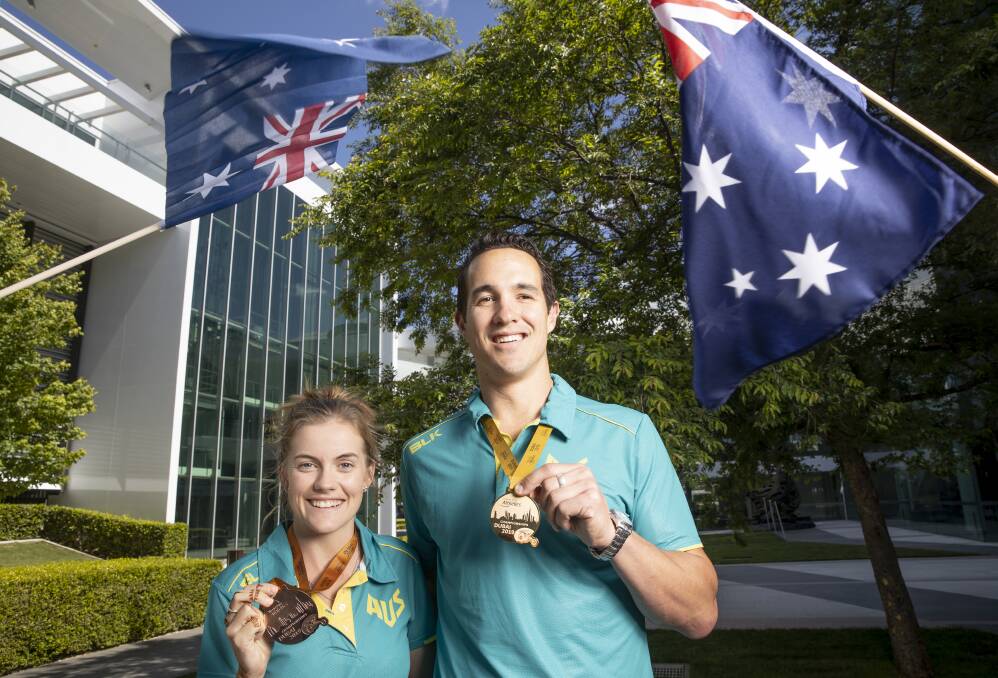 Para athletes Sarah Walsh and Cameron Crombie show off their worlds hardware after returning from Dubai. Picture: Sitthixay Ditthavong