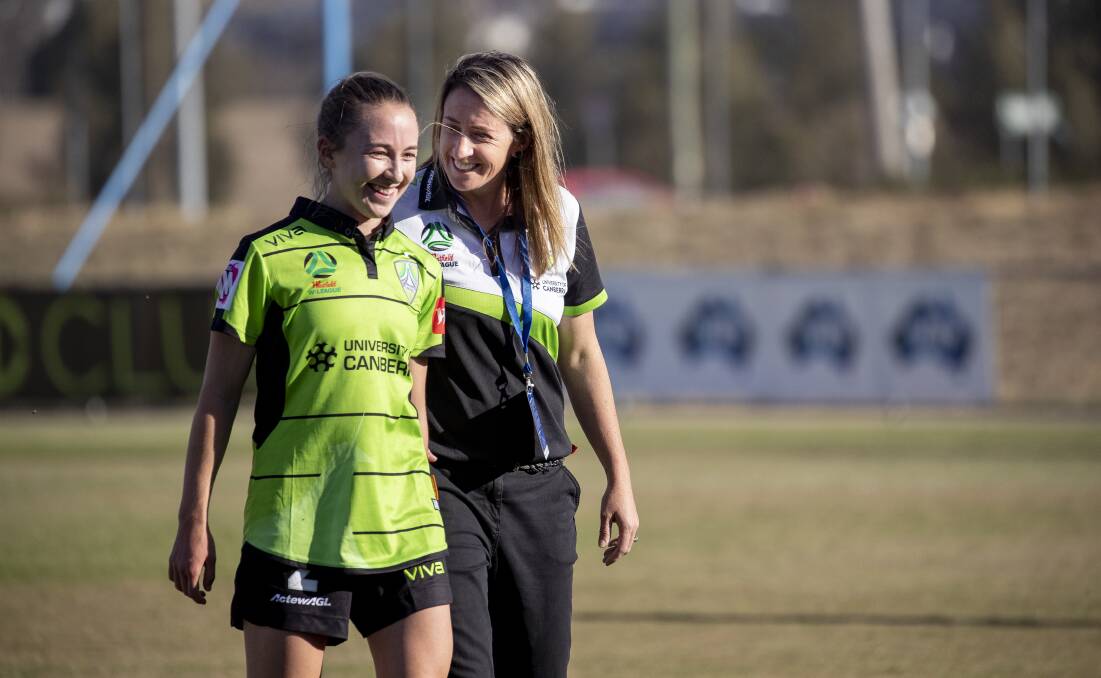 Canberra United's Laura Hughes with coach Heather Garriock. Picture: Sitthixay Ditthavong