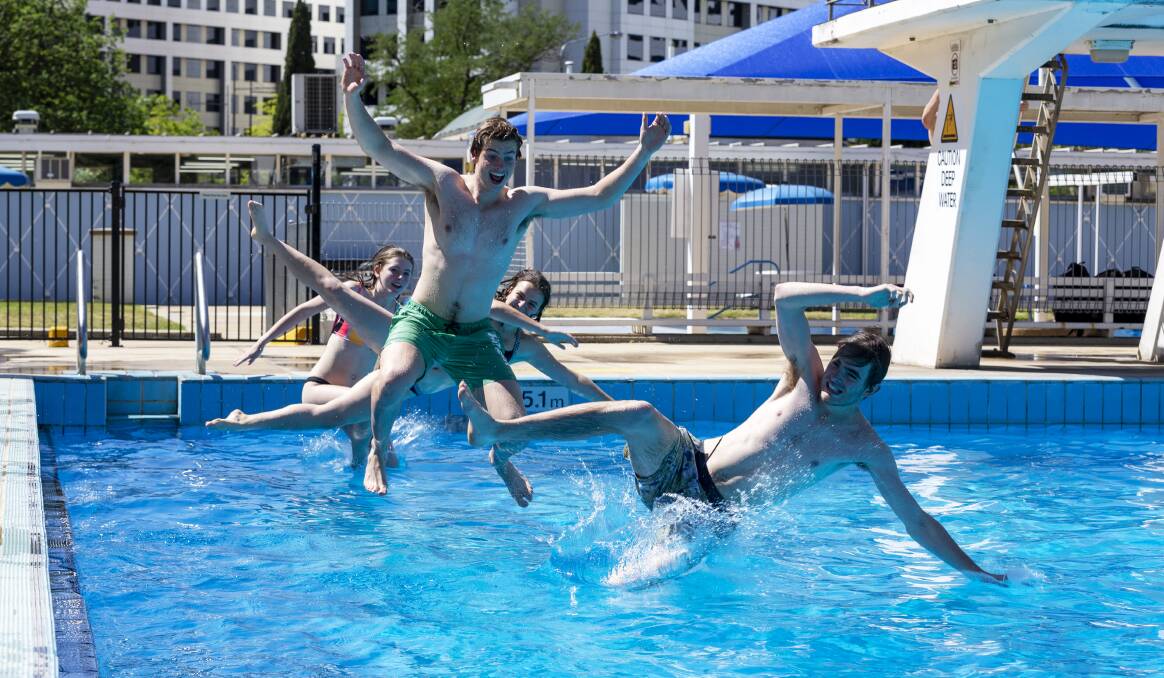 Canberrans cool off in the Civic Olympic pool. Picture: Sagi Biderman