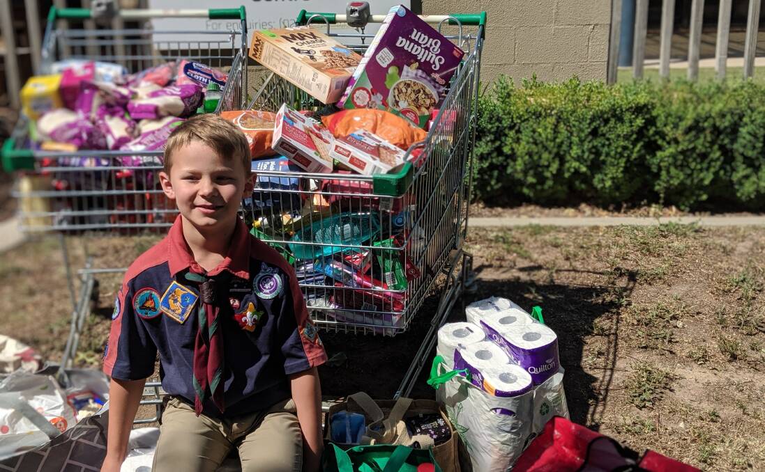 Seven-year-old Luke Bamford of Kambah raised $600 for the YWCA Canberra food bank program.