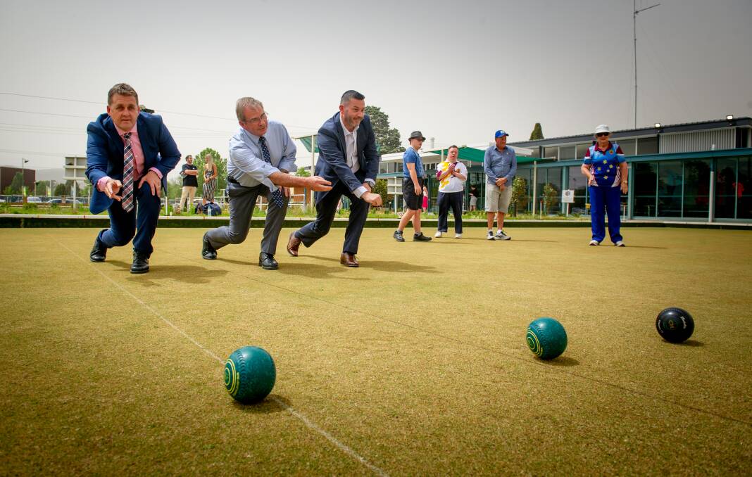 Campbell & George general manager Shane Holland, Queanbeyan mayor Tim Overall and Vikings Group chief executive Anthony Hill at the revamped Queanbeyan Bowls Club. Picture: Elesa Kurtz