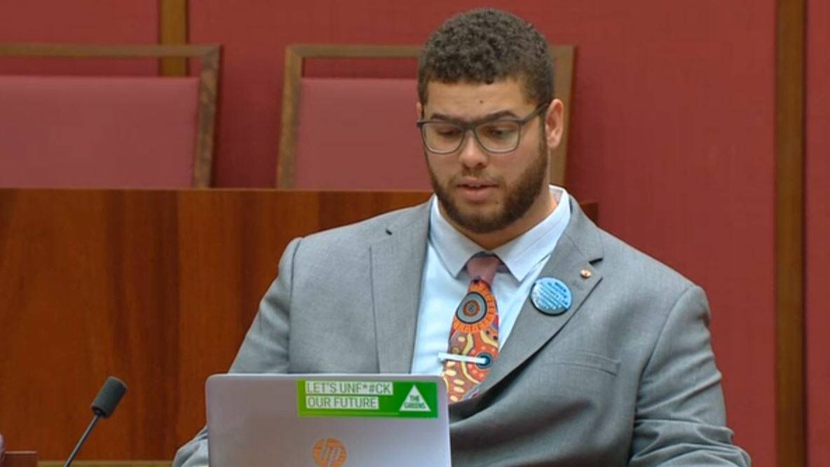 Jordon Steele-John with an unfortunate computer sticker in the Chamber on Wednesday. Source: Senate Hansard