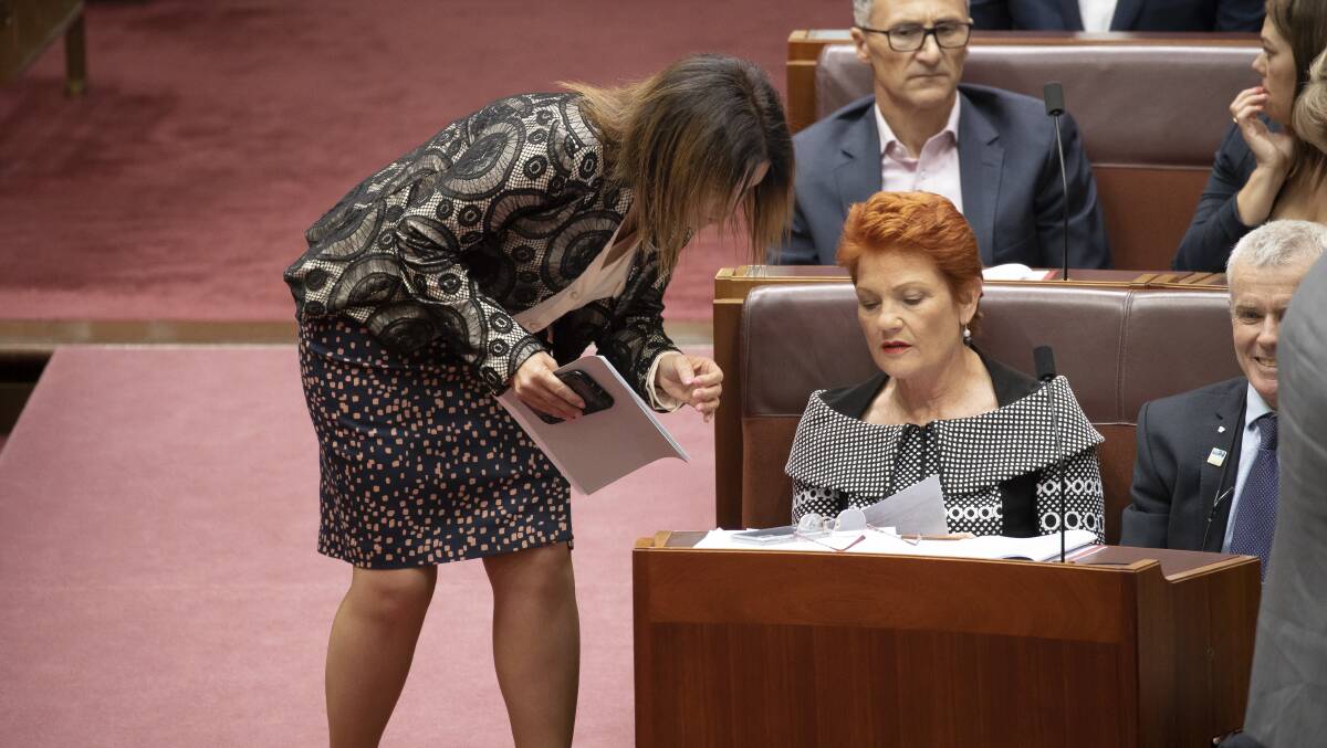 Senators Jacqui Lambie and Pauline Hanson during debate on the union-busting bill. Picture: Sitthixay Ditthavong