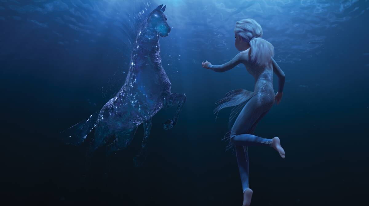 Elsa, right, encounters a Nokka mythical water spirit that takes the form of a horse - in Frozen II. Picture: Disney
