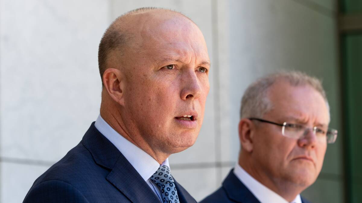 Home Affairs Minister Peter Dutton (left) has called for "transparency" over the origins of COVID-19. Picture: Elesa Kurtz
