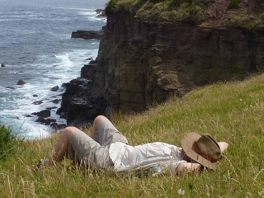 Tim takes a rest mid-way along the Kiama coastal track. Picture: Tim the Yowie Man