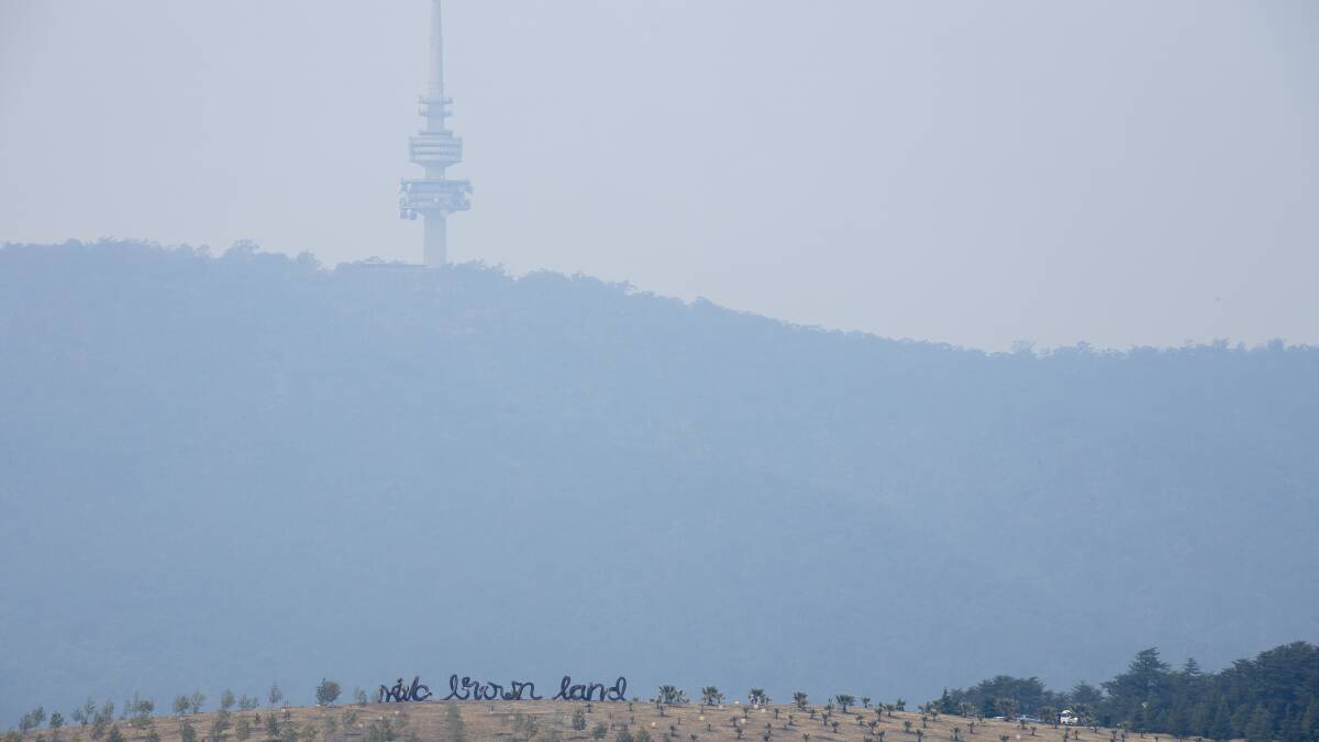 The National Arboretum seen through smoke haze on Sunday. Picture: Sitthixay Ditthavong