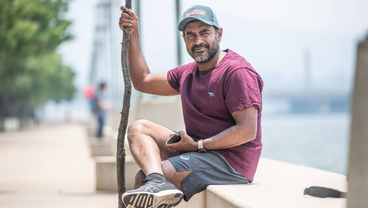 Concerned in Canberra but not frightened. Tariq Yussouf remembers the serious pollution in Bangladesh when he was a boy. Picture: Karleen Minney