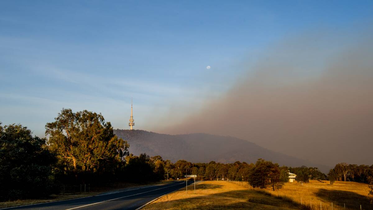 After an afternoon of clearer air, the smoke returned to Canberra on Tuesday evening. Picture: Elesa Kurtz