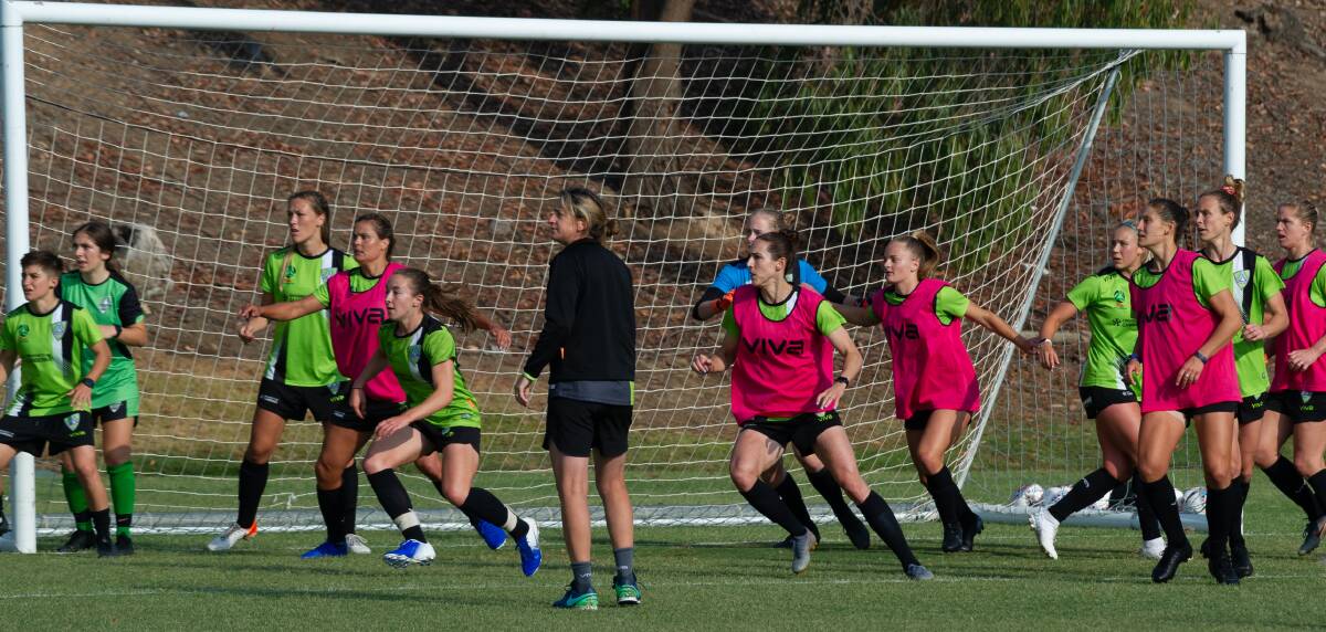 Canberra United beat the heat and the smoke by training early on Wednesday. Picture: Karleen Minney