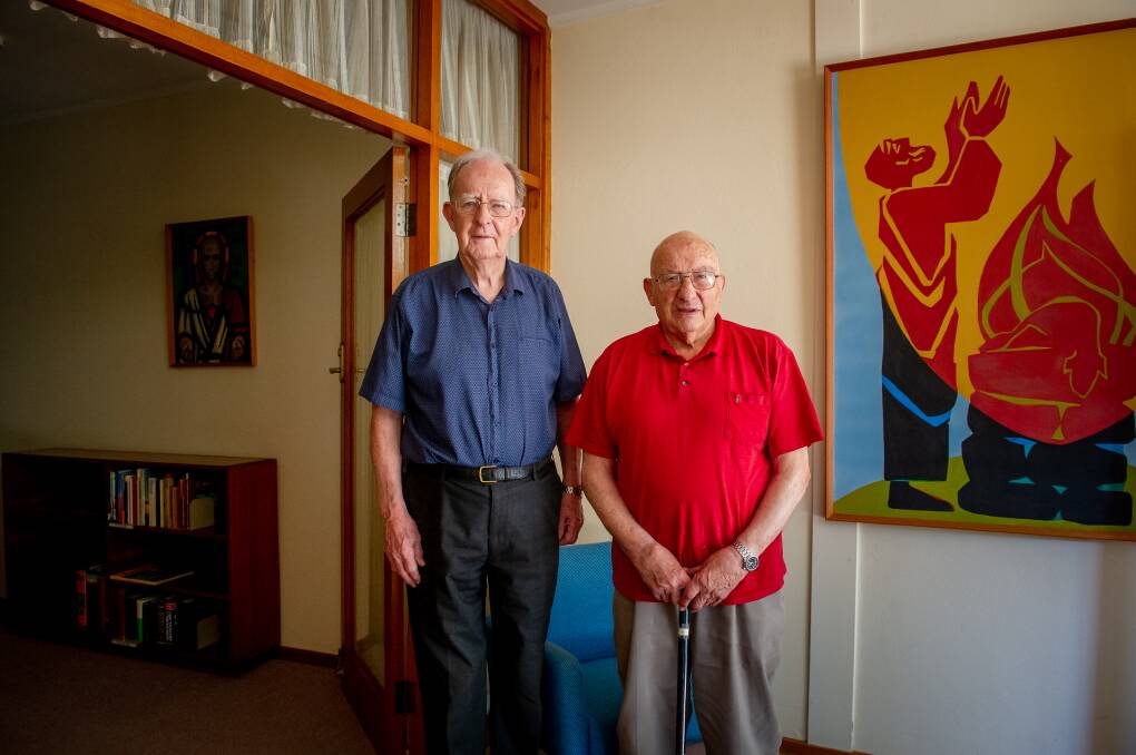 Father Jim Littleton, 89, and Father Harold Baker, 96, at the Missionaries of the Sacred Heart residence at Daramarlan College. Picture: Elesa Kurtz
