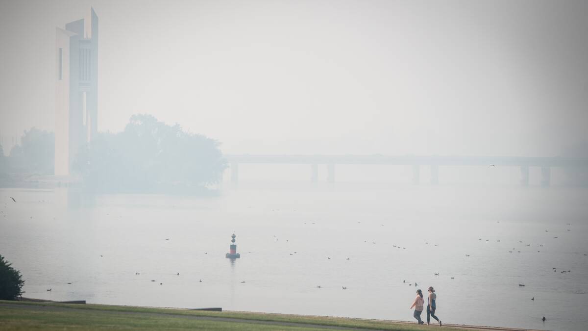 The National Carillon and Lake Burley Griffin under heavy smoke haze due to NSW bushfires. Picture: Karleen Minney