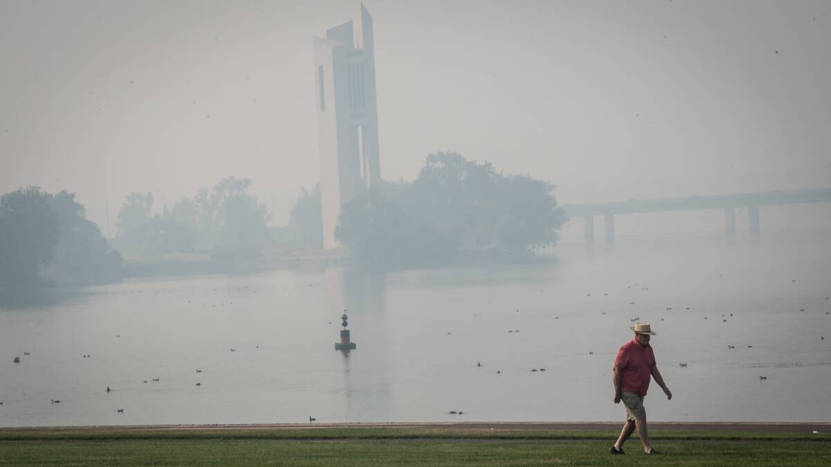 The National Carillon and Lake Burley Griffin under heavy smoke haze due to the NSW bushfires. Picture: Karleen Minney