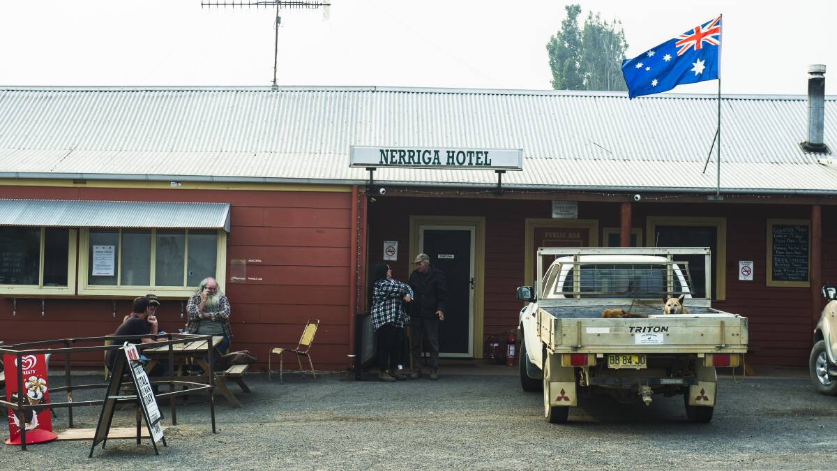 Local residents took shelter in the Nerriga Hotel as the NSW Tianjara fire impacted Nerriga on Saturday. Picture: Dion Georgopoulos