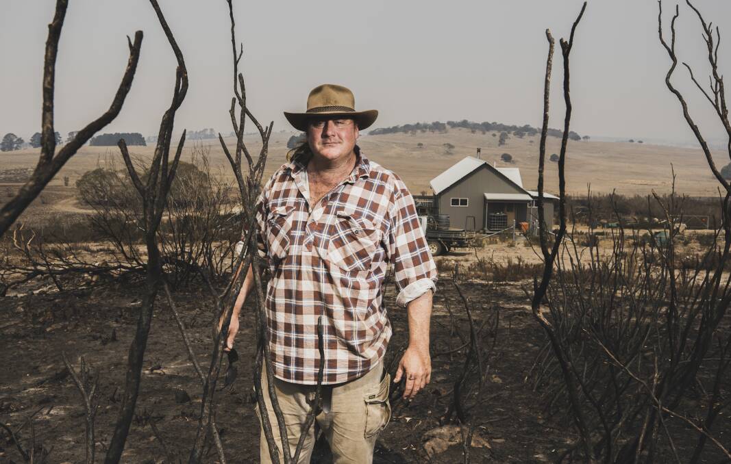 Matthew Hulse at his property near Braidwood, where his house was saved despite a bushfire burning within metres of it. Picture: Dion Georgopoulos
