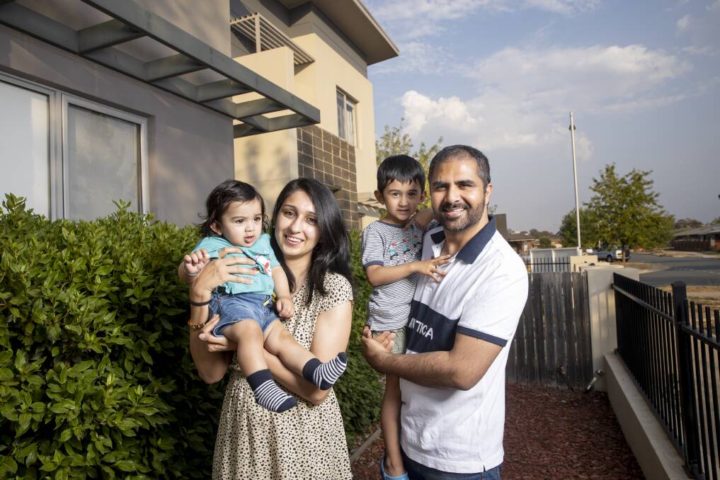 Shaan Sodhi (nine months), Gurleen Kaur, Waris Sodhi (3), and Arish Sodhi have made their home in Bonner. Picture: Sitthixay Ditthavong