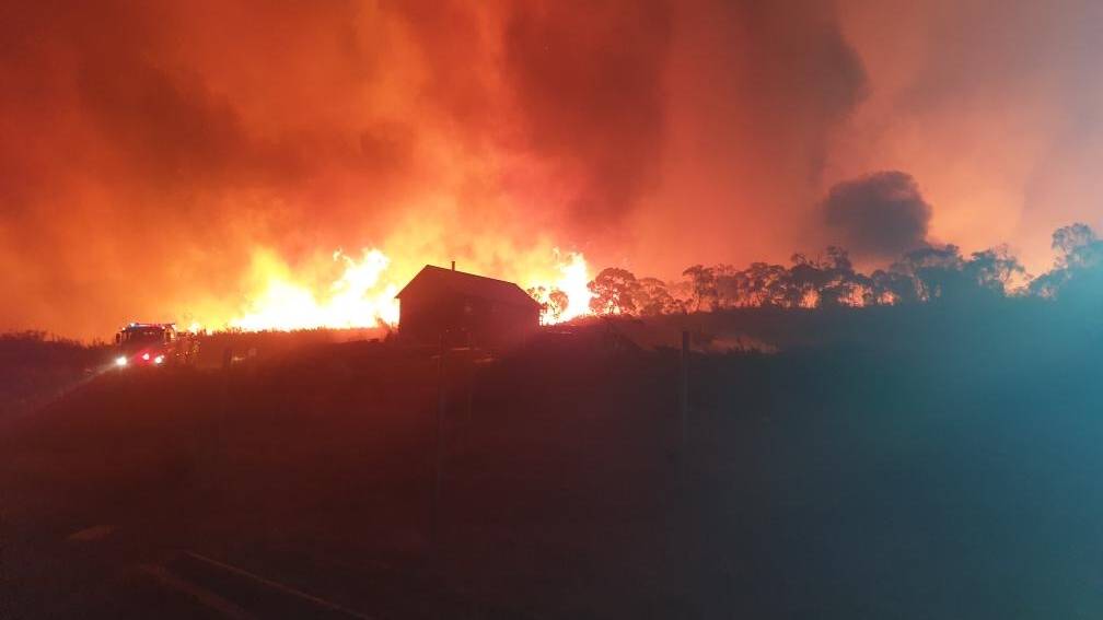 Matthew Hulse's house near Braidwood, surrounded by flames on November 29. Picture: Matthew Hulse