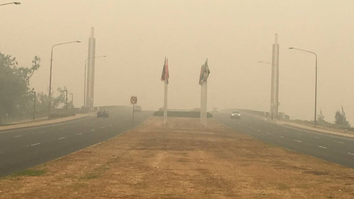 Commonweath Avenue bridge in Canberra clouded in smoke haze.