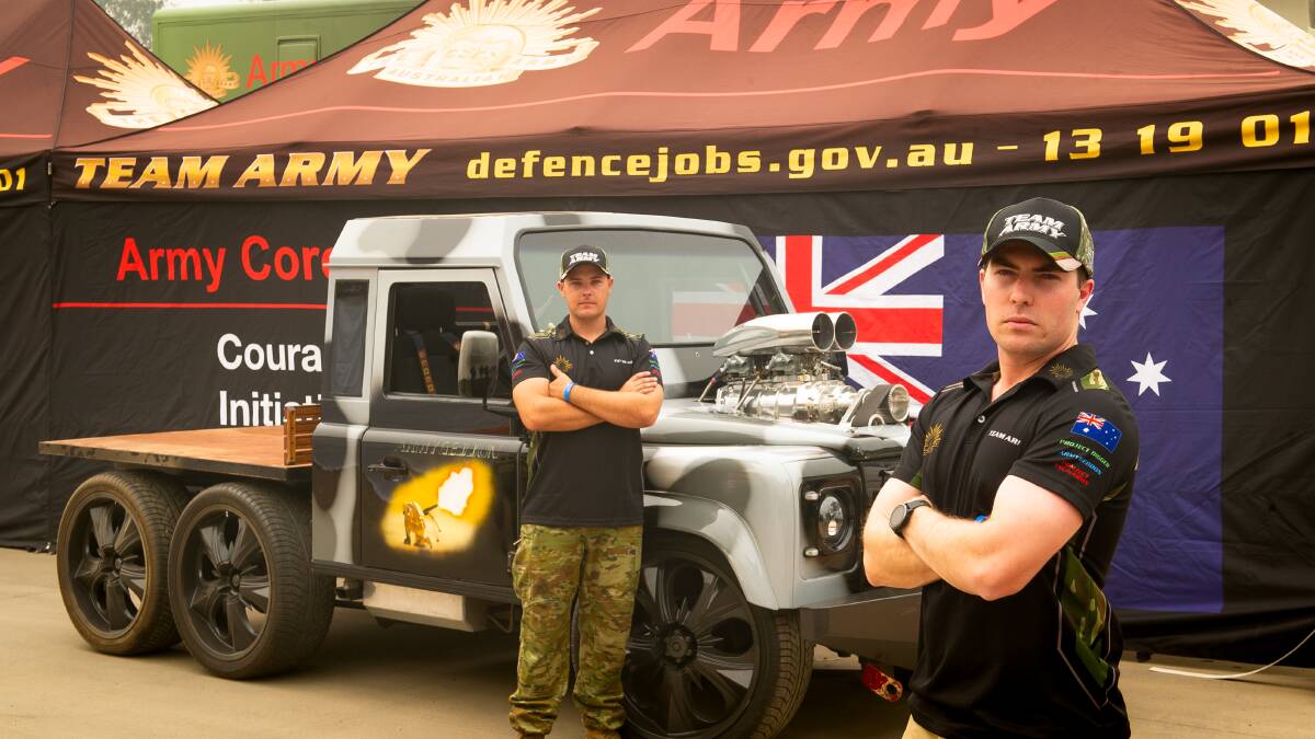 Team Army members Private Carl Waldeck and Captain Alex Schmidt with their Summernats burnout vehicle Armygeddon. Picture: Elesa Kurtz
