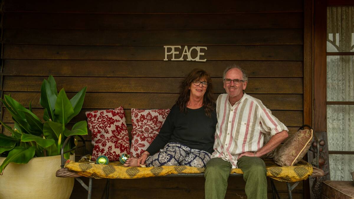 Mogo couple Gayle Smith and Phil Mayberry were delighted to find their home and business both intact after the fires swept through Mogo this week. Picture: Karleen Minney
