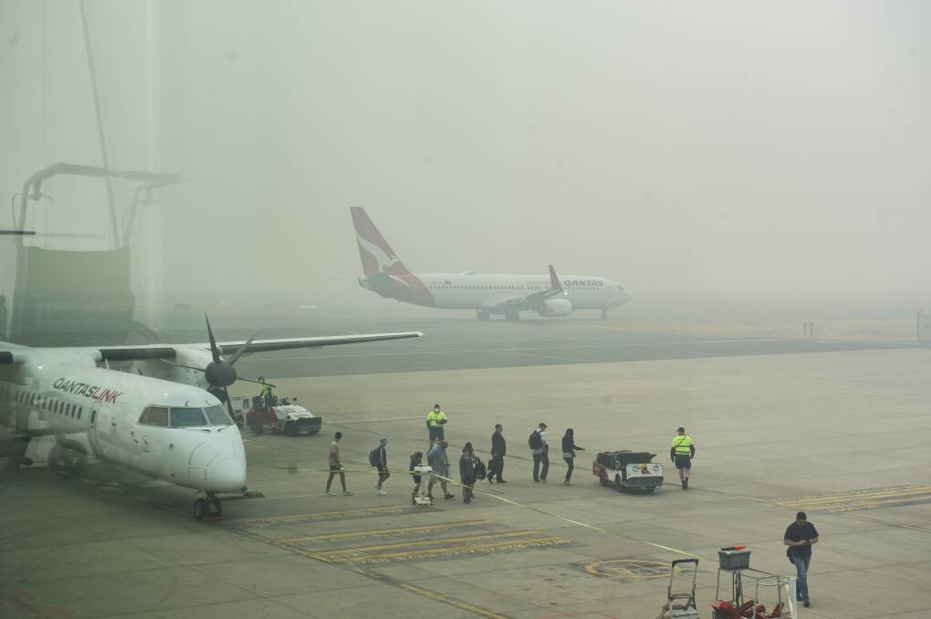 Thick smoke haze over Canberra Airport on Thursday morning. Picture: Dion Georgopoulos