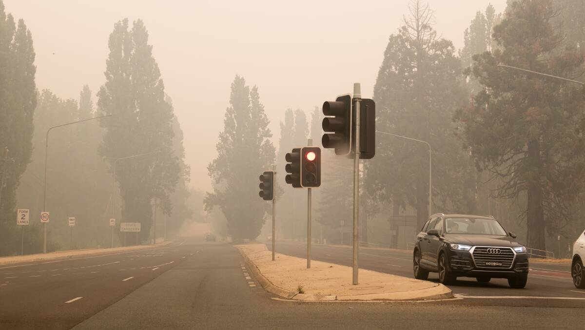 Smoke on Canberra Avenue on Sunday. Picture: Elesa Kurtz