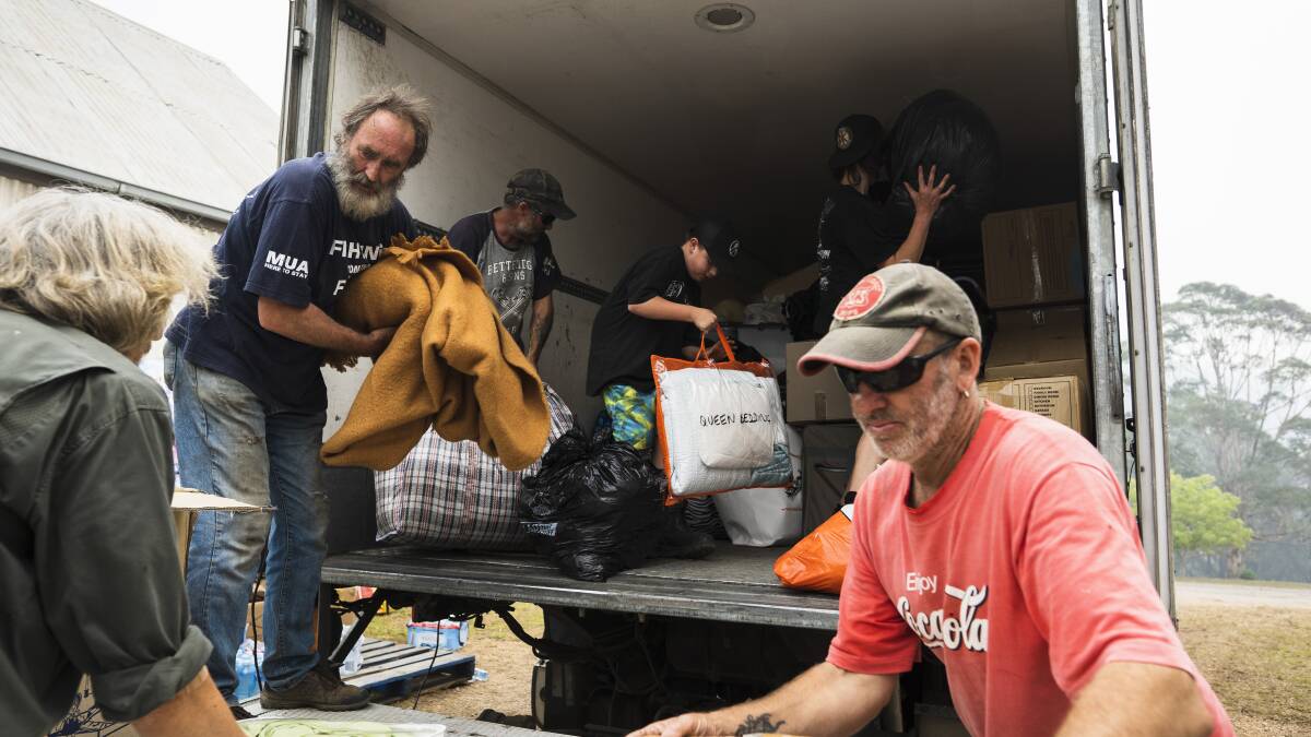 Volunteers help out at the Cobargo relief centre for people in need. Picture: Dion Georgopoulos