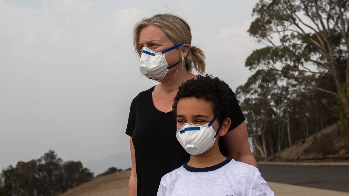 Michelle Daly with her son Liam wearing P2 masks. Picture: Elesa Kurtz