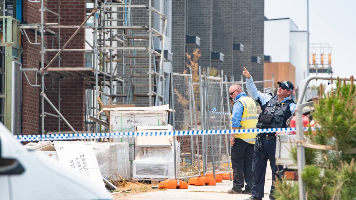 Worksafe inspectors at a Denman Propsect construction site earlier this month where a worker died. Picture: Elesa Kurtz