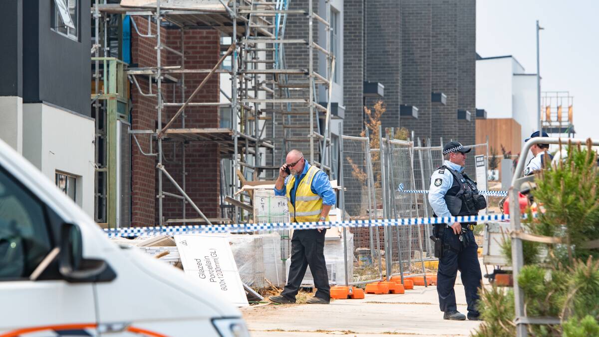 ACT Worksafe inspector at worksite where a death has occured in January. Picture: Elesa Kurtz