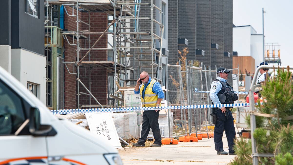 ACT Worksafe inspector at worksite where a death has occured on Ada Norris Avenue Denman Prospect. Picture: Elesa Kurtz
