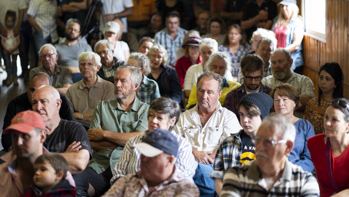 More than 100 people packed into the Tharwa Community Hall for a community meeting on Saturday. Picture: Dion Georgopoulos