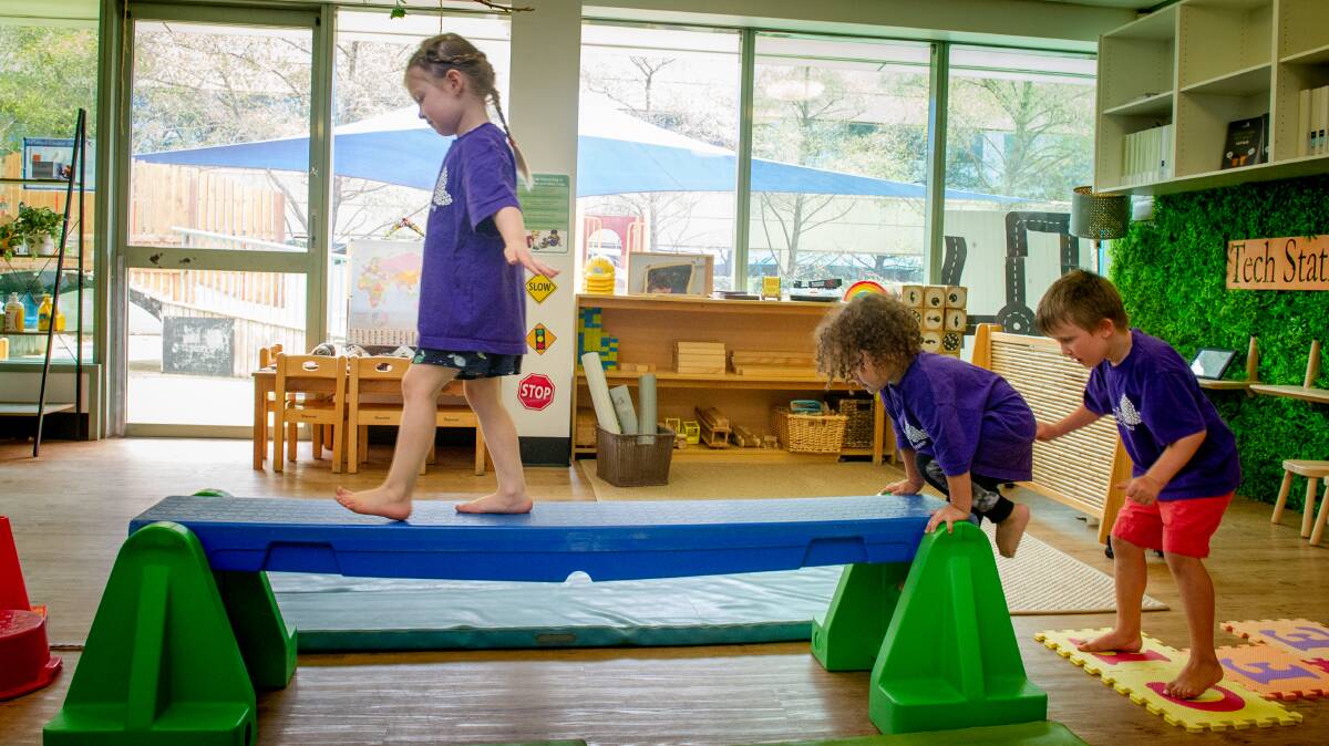 Papilio Early Learning Centre's Aurora Butler 4, Leon Janz 3 and Oliver Mitchell 4, playing indoors. Picture: Elesa Kurtz