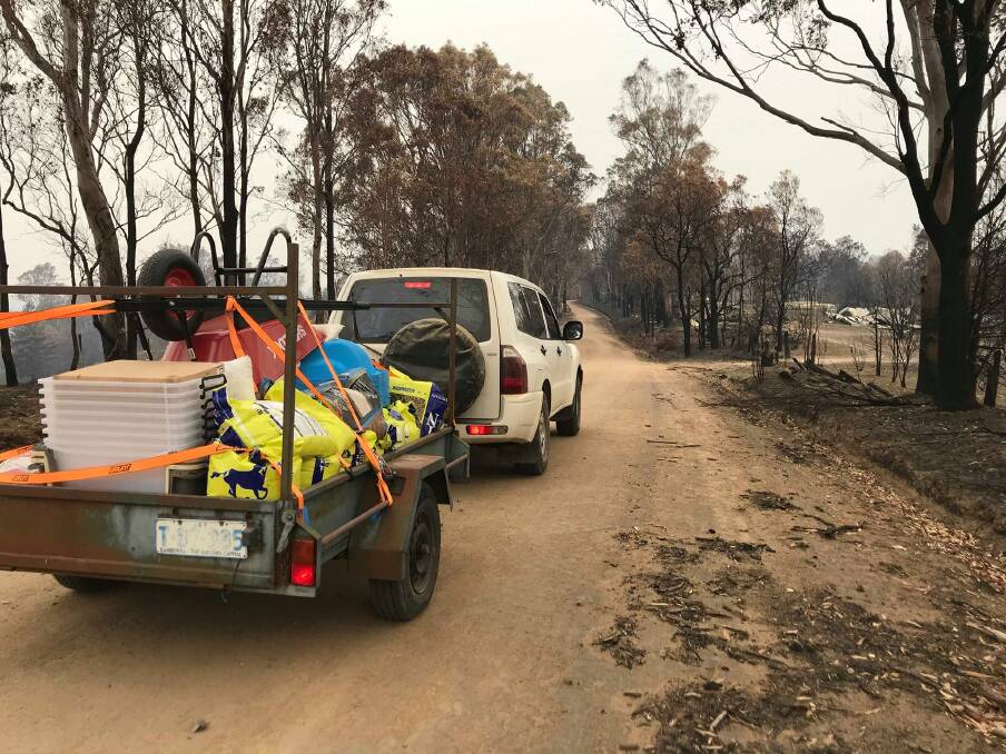 Supplies from Canberra Pet Rescue being ferried into a bushfire-affected area.