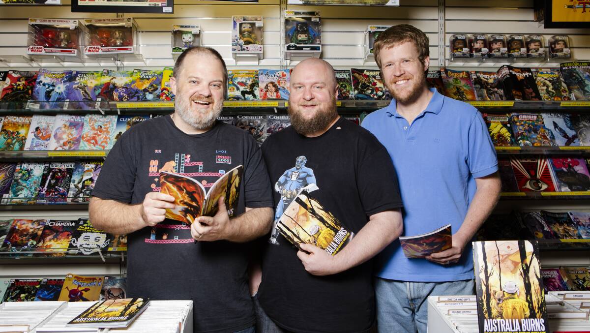  From left, Impact Comics co-owner Mal Briggs, Australia Burns artist, publisher and contributor Tim Stiles, and writer and contributor Shane W. Smith. Picture: Jamila Toderas