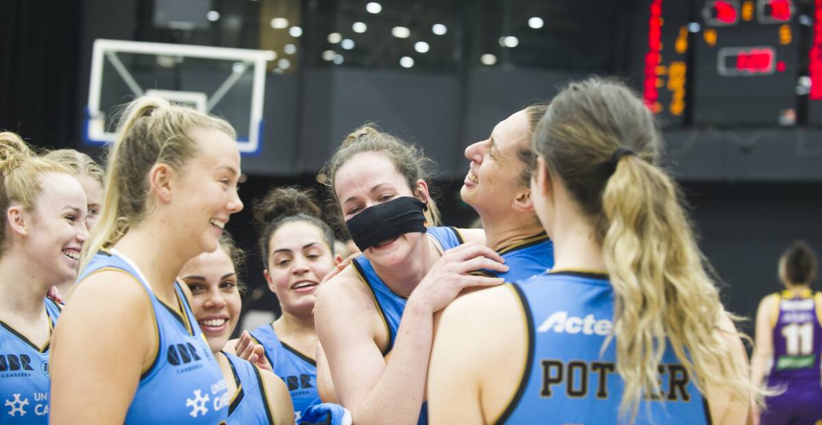 A bandaged Keely Froling, centre, is set for her WNBL return this week. Picture: Dion Georgopoulos