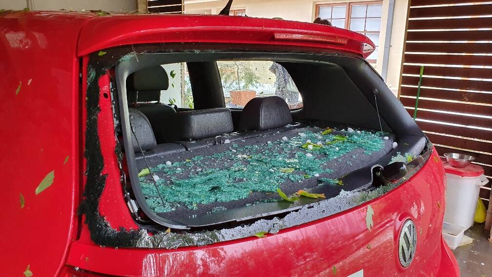 Damage to a car from the hailstorm in Latham. Picture: Warren Ludski