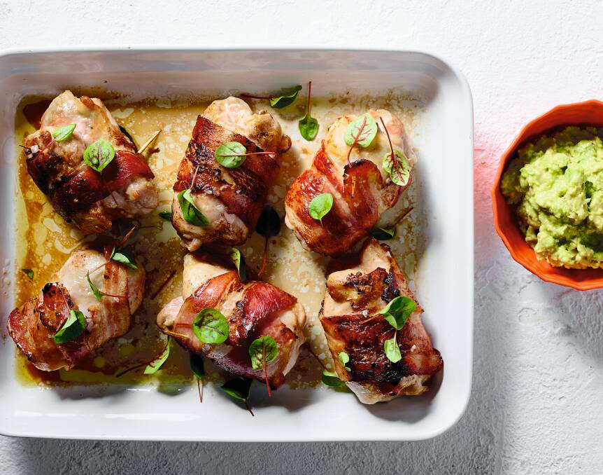 Chicken 'n' bacon wraps with zesty avo smash. Picture: Mark Roper