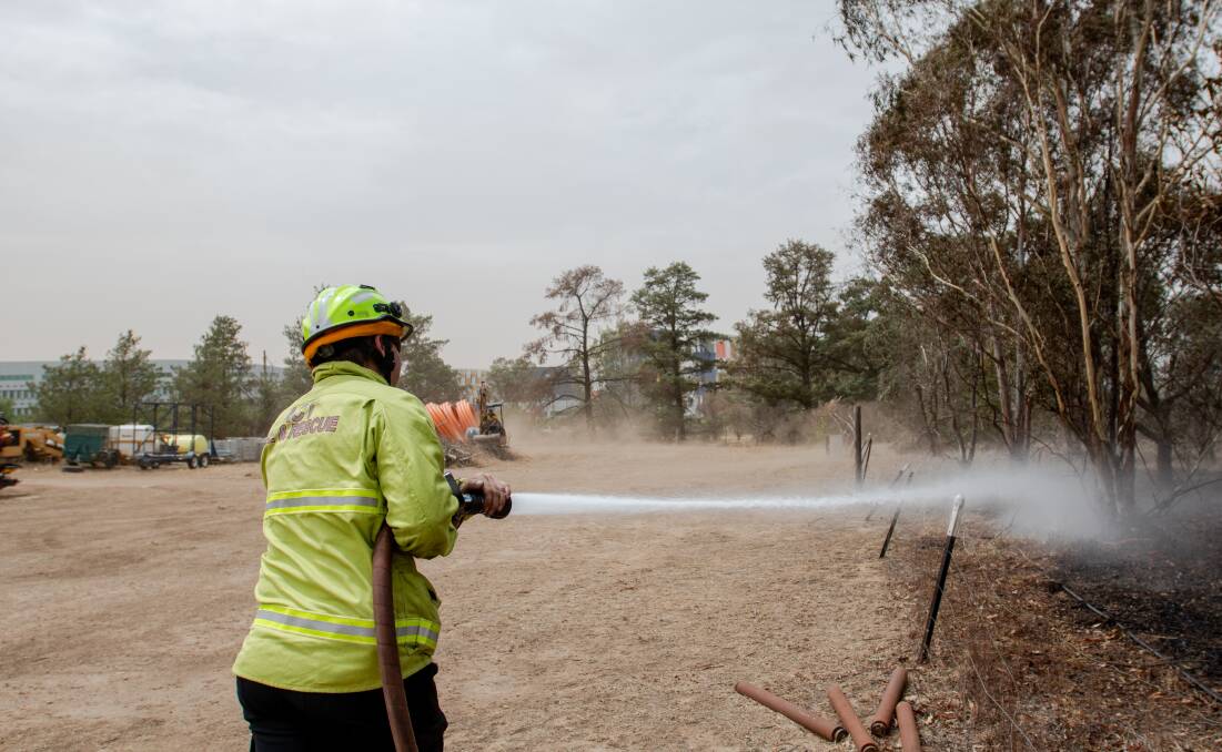 Firefighters work on fires on Thursday. Picture: Elesa Kurtz