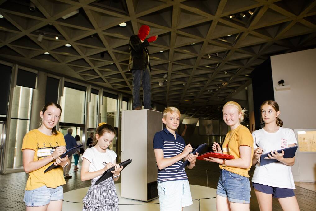 Catherine Simpson, 12, Lousia Simpson, 10, James Grant, 13, Lucy Grant, 15, and Emma Simpson, 14, try out digital drawing ahead of the National Gallery's Art Weekend. Picture: Jamila Toderas