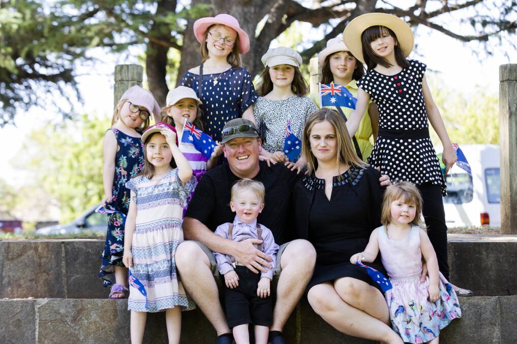 Claire and Mark Hooker with their children, twins Catherine and Elizabeth, 6, Rose, 5, Georgina, 11, Abigail, 7, Franchesca, 8, Charlotte, 10, Martina, 2, and Michael, 1. Pictures: Jamila Toderas