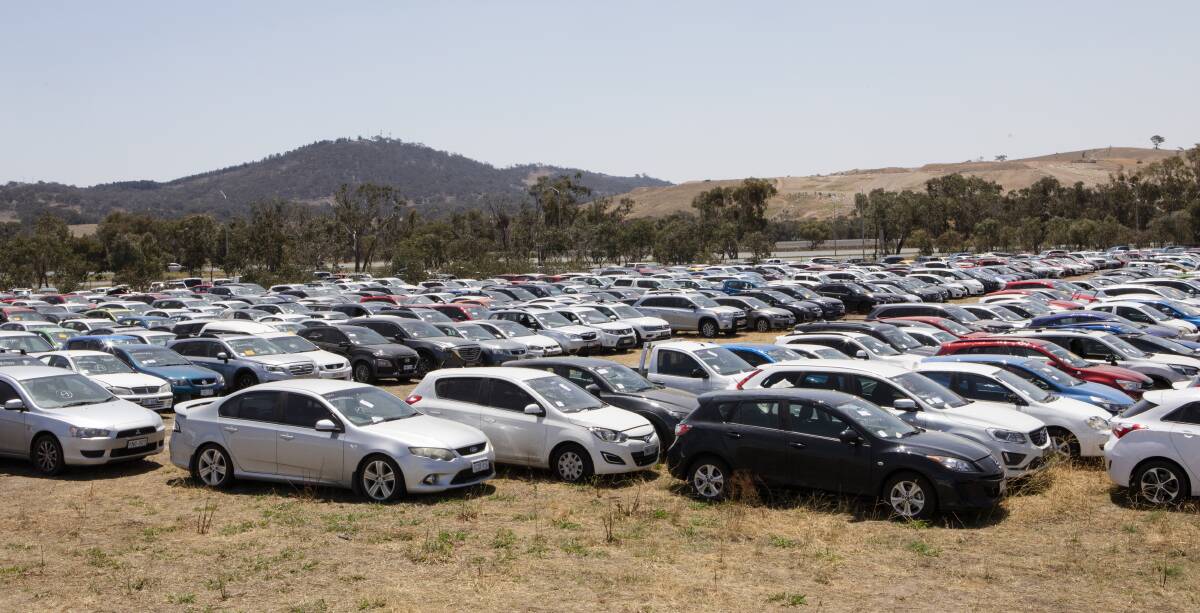  Hail-damaged cars sit in a Hume holding yard waiting to be assessed and processed by specialist hail-damage teams appointed by the insurers. Picture: Jamila Toderas