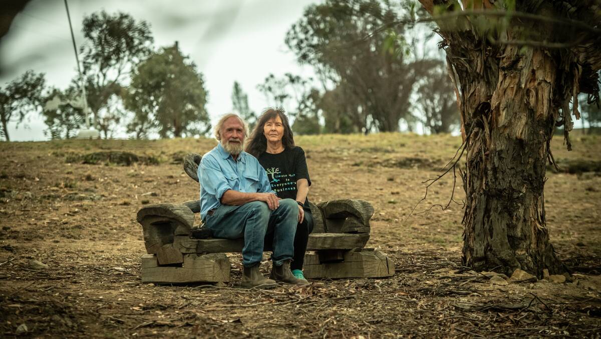 Pete and Jenny Filmer have decided to stay and fight for their home should the Orroral fires come their way. Picture: Karleen Minney