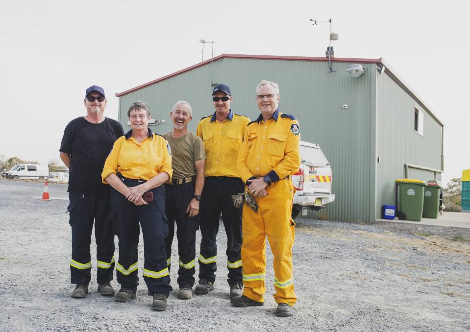 Kim Jordan, Chris Worth, John O'Keefe, Rhys McLarty and Dave Bromhead from the Burra NSW RFS fought fires at Michelago on Saturday. Picture: Dion Georgopoulos