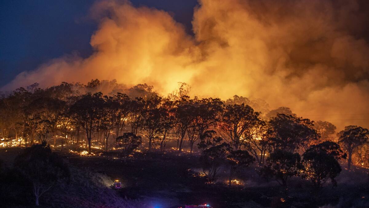 The Clear Range fire in NSW. The fire was ignited after ember attacks from the Orroral Valley fire. Picture: Sitthixay Ditthavong
