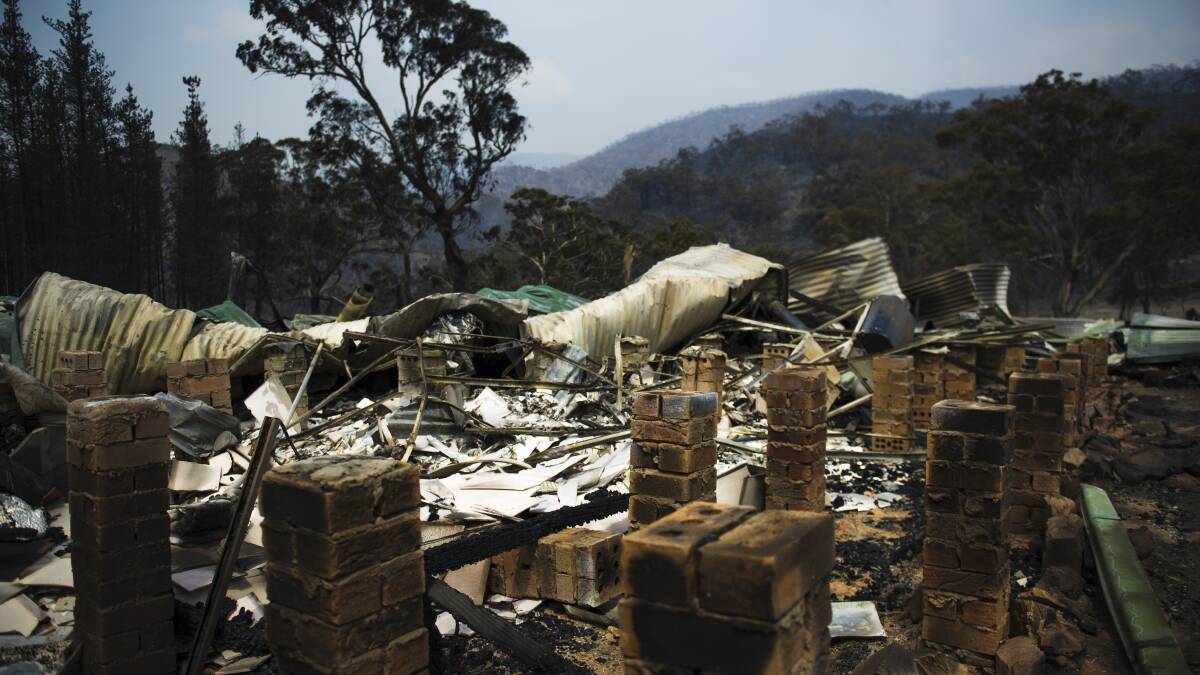 The aftermath at Annika Safe and Stephen Littlehales's property in Bumbalong Valley which was impacted by the Clear Range fire on Saturday. Picture: Dion Georgopoulos