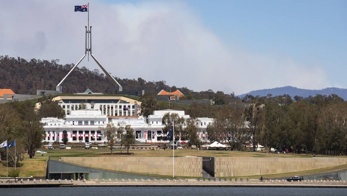 The summer fires and smoke could have significant implications for the ACT budget. Picture: Sitthixay Ditthavong